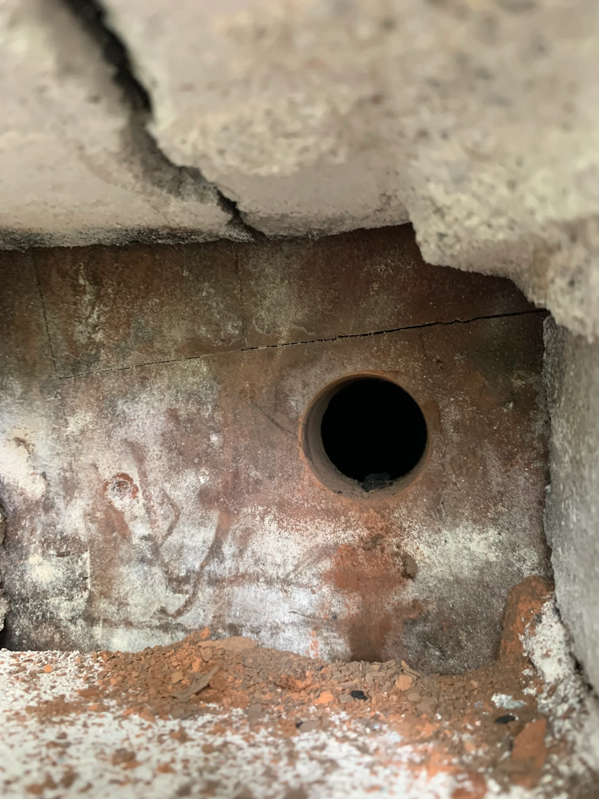 Drilled through the flue